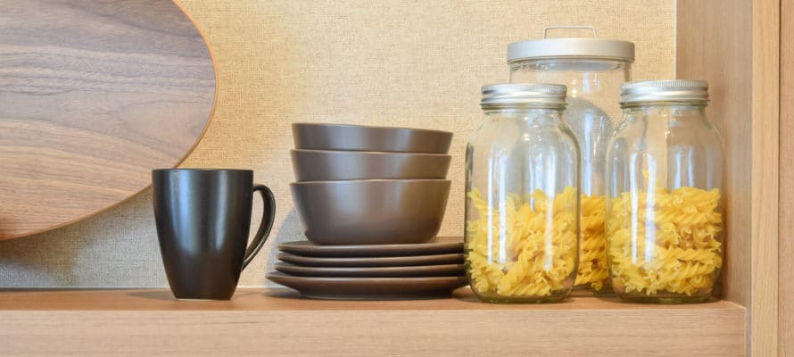 Utah home builder modern ceramic kitchenware and utensils on pantry shelf